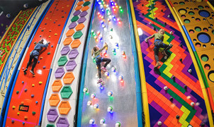 Reach new heights at namco funscape on their clip n climb walls