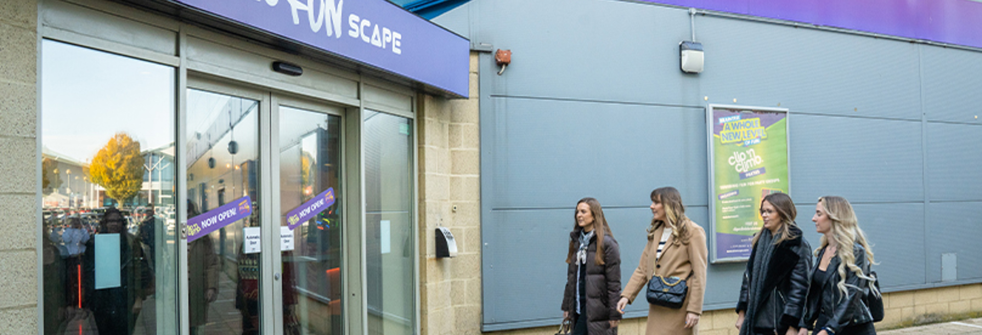 Group of women walking into Namco Funscape Braintree entrance 